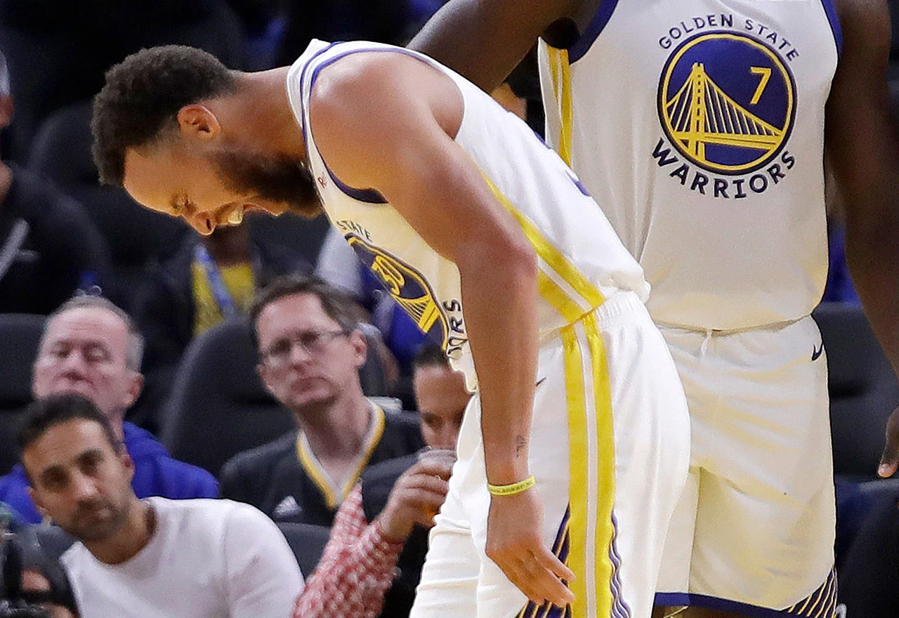 Stephen Curry slomio ruku