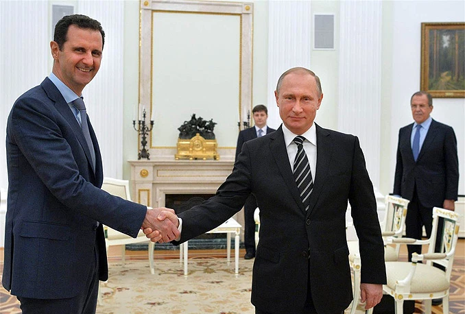 Putin misli da je prerano govoriti o davanju političkog azila Assadu