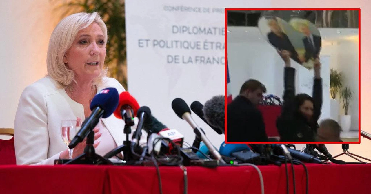 VIDEO: Prekinuta press konferencija Le Pen, djevojka podigla Putinovu sliku