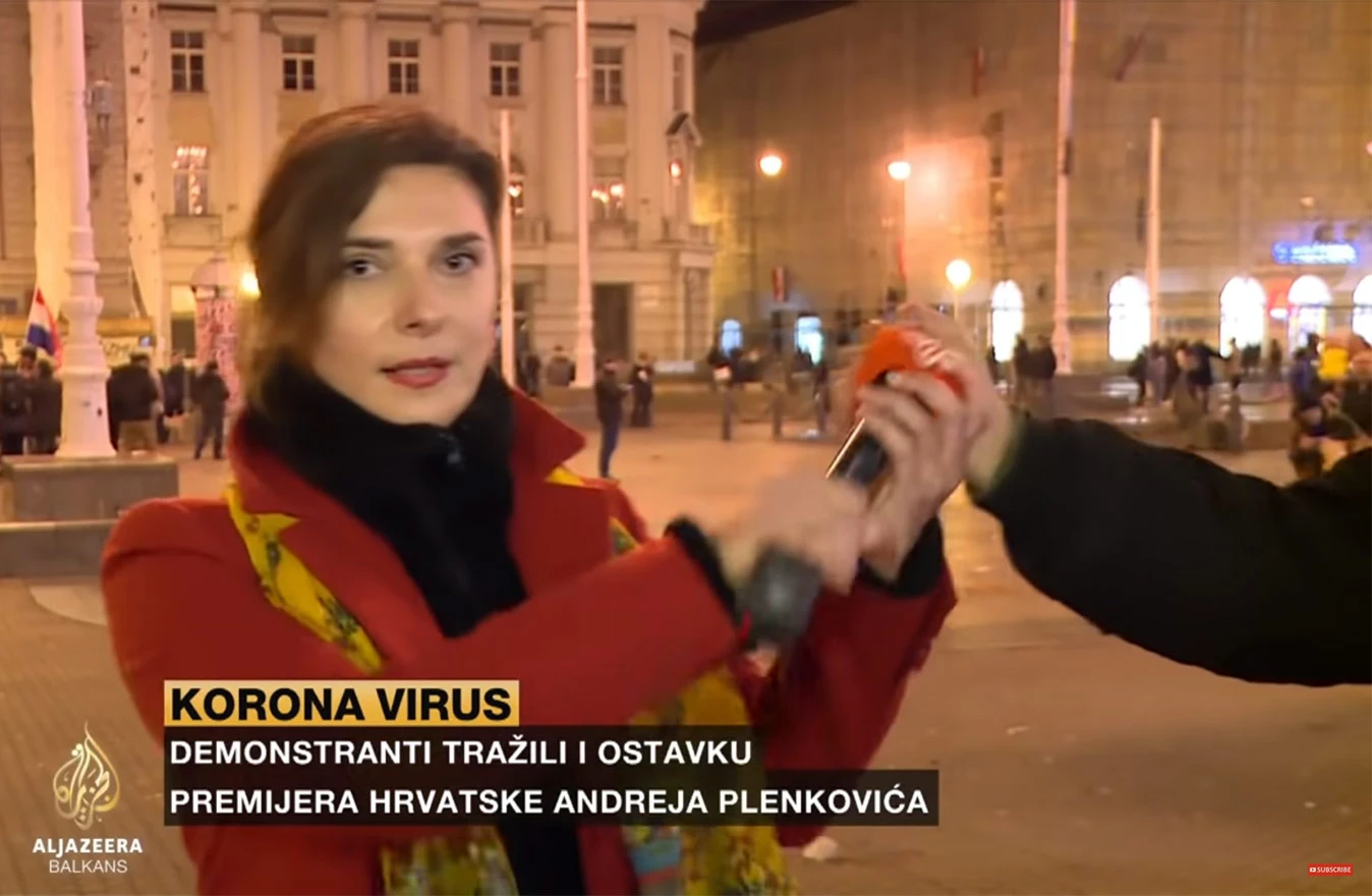 Uhićen muškarac koji je tijekom prosvjeda reporterki Al Jazeere uzeo mikrofon